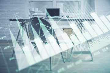 Double exposure of financial graph drawing and office interior background. Concept of stock market.