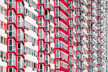 Part of Modern residential apartment with flat building exterior. Detail of new house and home...