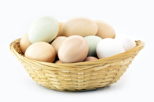 typical caipira egg from brazil on isolated white background in straw basket