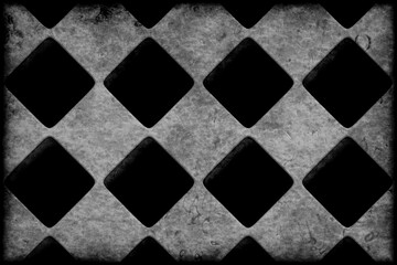 Grungy checkered diamond pattern wallpaper background in black and white