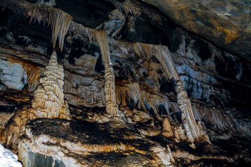 PETAR - Alto Ribeira Tourist State Park. Internal images of caves, with geological formations of water dripping from the ceiling, forming stalactites and stalagmites formed on the floor. 