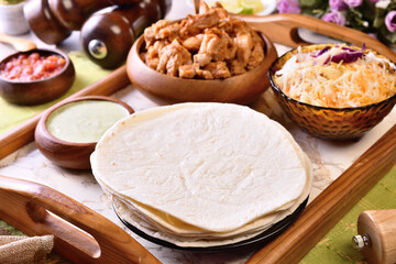 Traditional Mexican food, burritos with meat and cheese