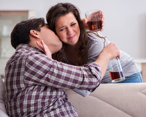 Domestic violence concept in a family argument with drunk alcoho