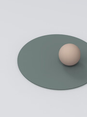 green plate and beige sphere on white background.
