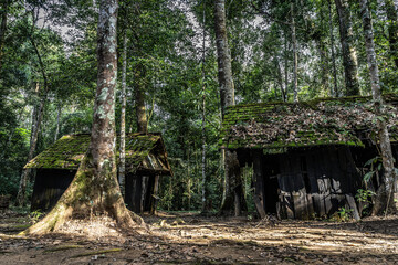 Landscape of a very old wooden house from the world war in the forest in Thailand.