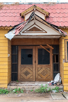 Old Door And The Yellow House