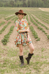 Cowboy girl in the field