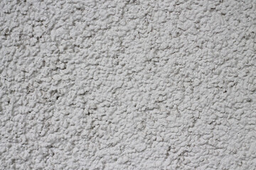 White wall texture with abstract pattern, close-up, with blank space for text and idea design