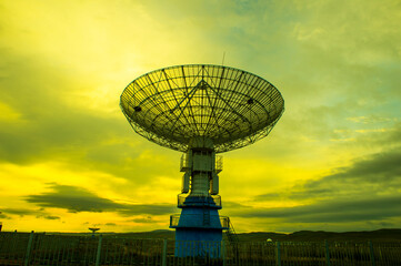 Radio telescopes and the Milky Way at night