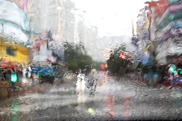 Rainy streets from the driver's seat