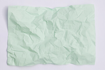 green crumpled paper background, texture for web design screensavers.