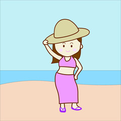 cute girl with sombrero on beach