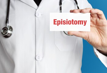 Episiotomy. Doctor holds a business card in his hand. Text is on the sign. Close up.