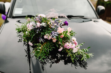 Wedding car with beautiful decorations. Flower decor.