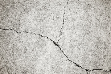 Grunge concrete cement wall with crack in industrial building, great for your design and texture...