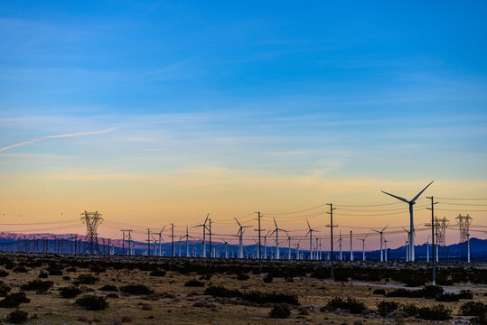 Silhouette of Windmills at dusk in Palm Springs, California, USA.