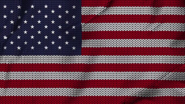American waving flag in knitting background for the winter season
