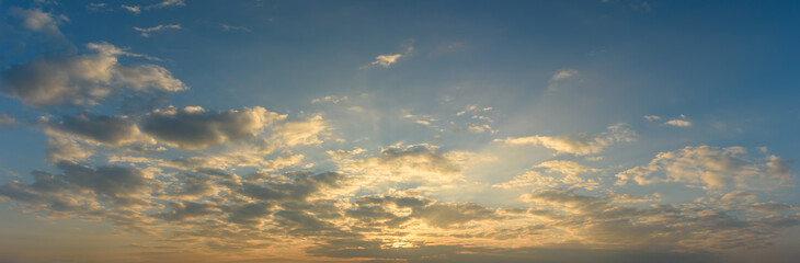 Naklejka na ściany i meble Beautiful clouds sky sunset background