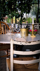Shabby chic restaurant table in a restaurant in a conservatory