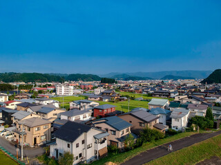 Fototapeta na wymiar 航空撮影した夏の日本の田舎の街風景