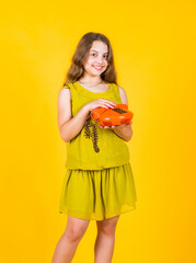 You are our priority. Small kid having fun. business girl in office. success, creativity and innovation. back to basics. talking by retro telephone. Business communication concept. childhood