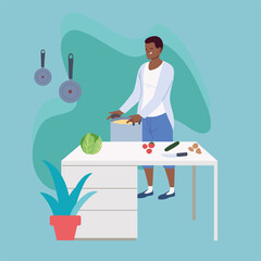 Young man cooking a delicious soup in the kitchen