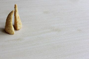 Cone of Corns Snack. Yellow, puffed.
