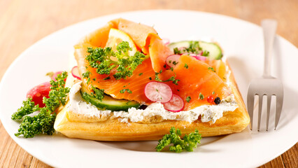 waffle with cream, smoked salmon and cucumber