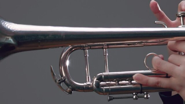 Trumpeter playing music jazz instrument 