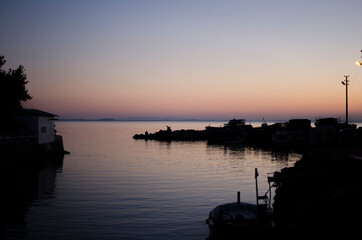 Naklejka premium sunset over the river