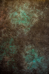 Beautiful dark green texture abstract wall background, ribbed surface texture with copy space, unusual mottled brown surface background
