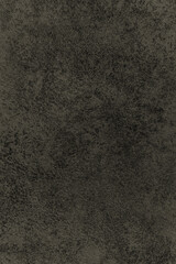 Beautiful dark texture abstract wall background, ribbed black surface texture with copy space, unusual gray spotted surface background