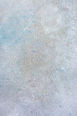 Light wall with abstract spots. Beautiful gray, white texture, abstract wall surface background, vintage surface texture with copy space, unusual spotty surface.