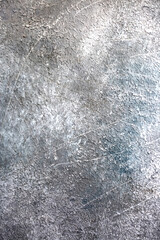 Light wall with abstract spots. Beautiful gray, white texture, abstract wall surface background, vintage surface texture with copy space, unusual spotty surface.