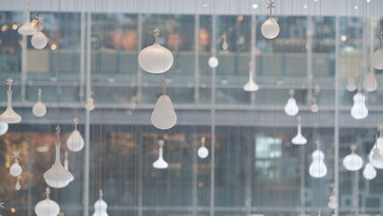 Background image of White mobile made of glass Suspended in the air.