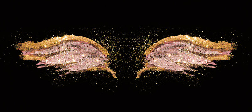 Golden glitter on abstract gold and pink hand painted wings on black background