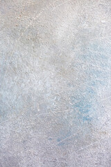 Light wall with abstract spots. Beautiful gray, white texture, abstract wall surface background, vintage surface texture with copy space, unusual spotty surface.