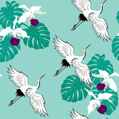 Seamless vector illustration with birds cranes, monstera and orchid.