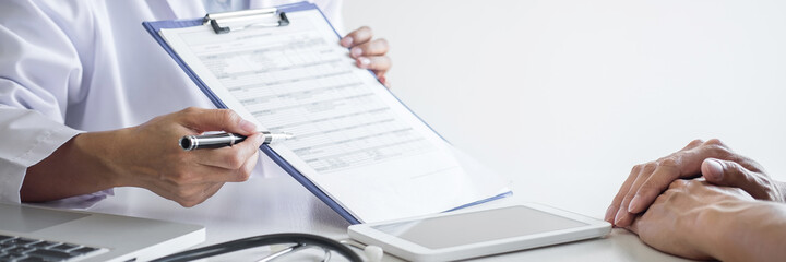 Doctor presenting report of diagnosis, symptom of disease and recommend something a method with...