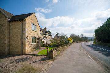 English Country Cottage in the sunshine in Cotswolds, England, UK