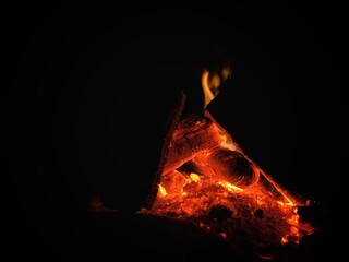 Burning coal in a fire at night