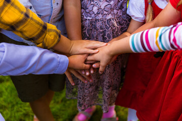 Kids joining hands together