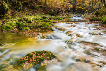 Autumn. Explosion of colors on the waterfalls and streams of the Val d'Arzino.