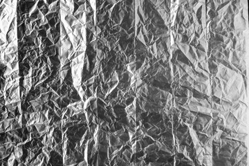 silver rough wrinkle foil texture. aluminium foil texture background. metal plate
