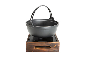 Japanese a hot pot on a stove.