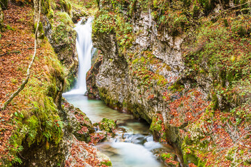 Autumn. Explosion of colors on the waterfalls and streams of the Val d'Arzino.