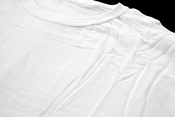 white t-shirt fabric details for badge mockups. plain t-shirt with black background for design...