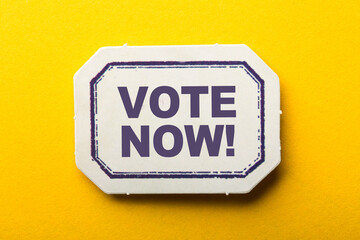 Vote Now Frame Label On Yellow Background