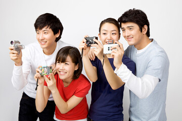 friends holding cameras