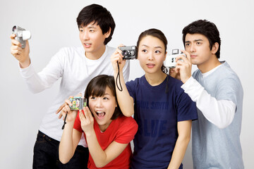 friends holding cameras